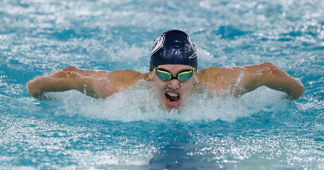 Squalicum’s  Alec Rodriguez-Stiff swims the 100-yard butterfly as Bellingham wins a head-to-head meet versus the Storm 119-60 on Jan. 17 at Arne Hanna Aquatic Center.
