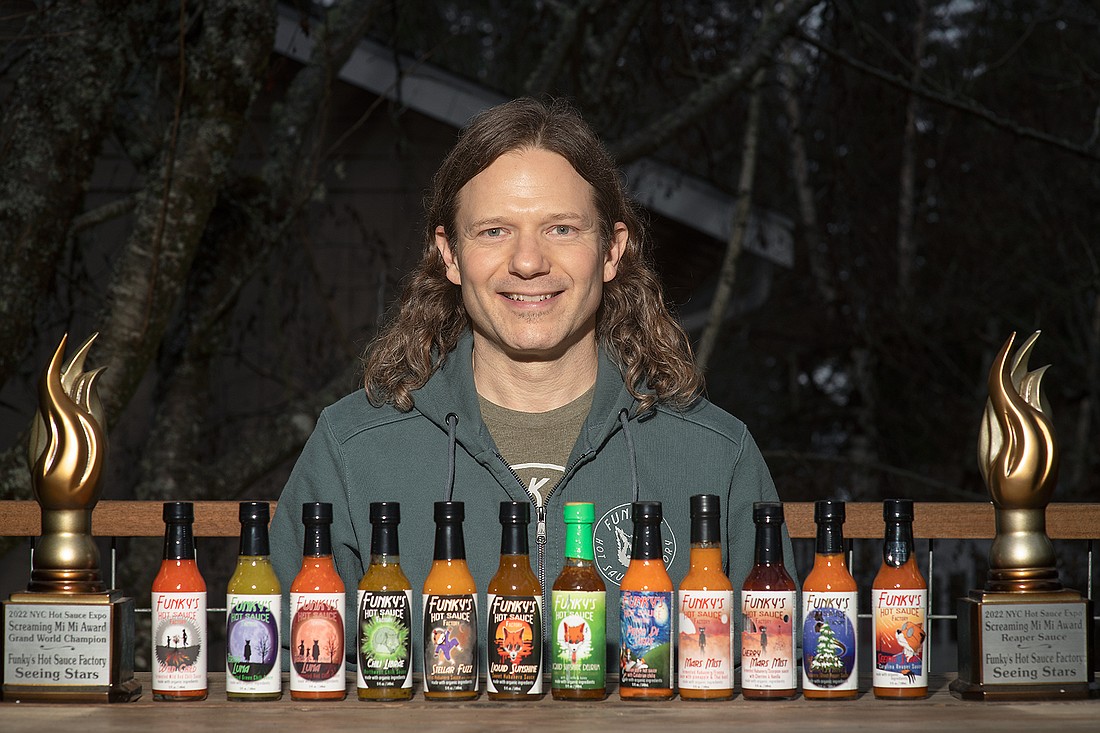Matthew Mini is the founder of Funky's Hot Sauce Factory in Bellingham and recipient of the "Grand World Champion" award at the 2022 NYC Hot Sauce Expo, on Jan. 17 with a variety of his sauces.