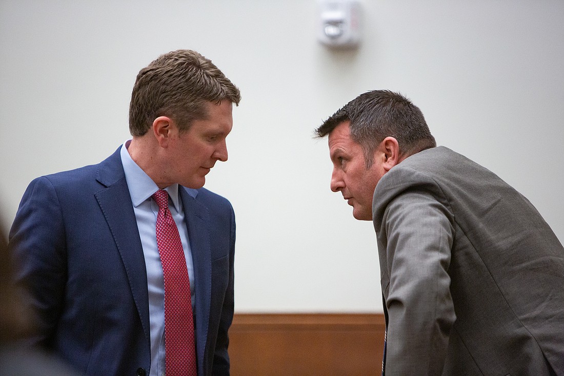 Attorney Shane Brady, left, and District Court Judge Jonathan Rands speak during a Jan. 27 hearing in the Whatcom County Superior Court. Rands, who took office on Jan. 9, has been temporarily restricted from ruling on 123 cases, all of which include DUI charges.