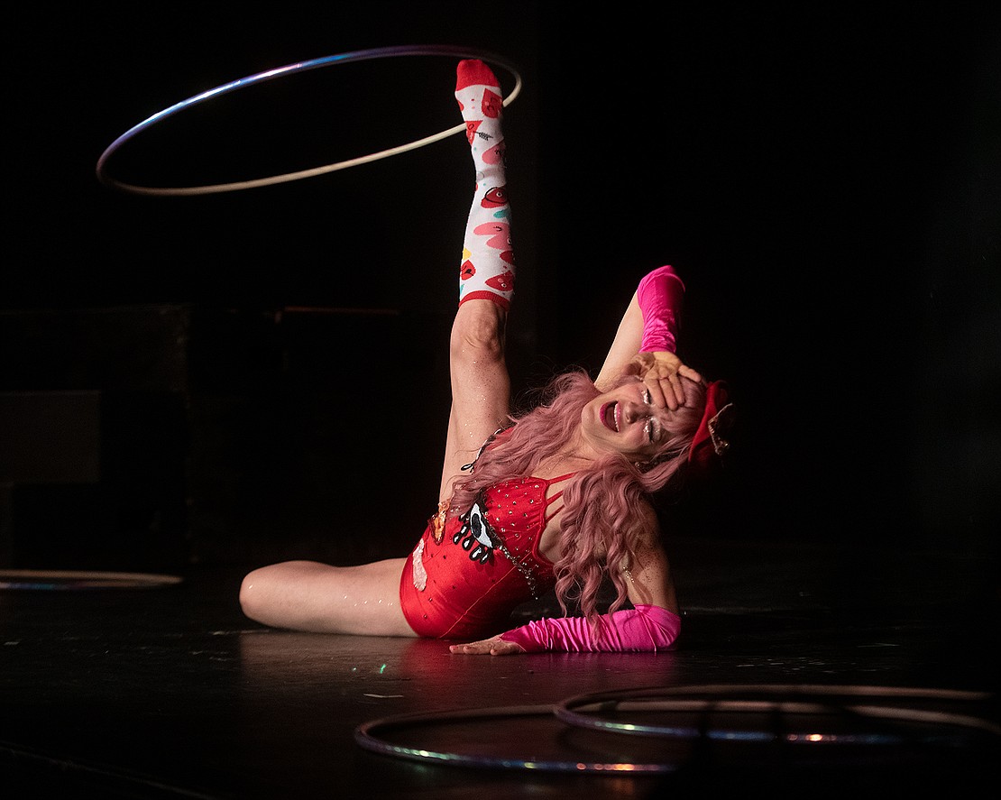 Tanya Gagné spins a hula-hoop around her foot while crying with a broken heart during the opening night of My Circus Valentine Friday, Feb. 10 at Cirque Lab. My Circus Valentine, which started in 2010, is the longest-running show produced by Bellingham Circus Guild.