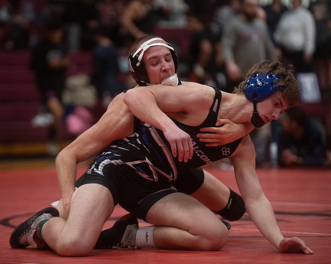 Mount Baker's Daniel Washburn gains control before pinning Cole Thorsen of South Whidbey in the championship match of the 145-pound weight class at the WIAA 1A Region 1 tournament at Mount Baker High School on Feb. 11.