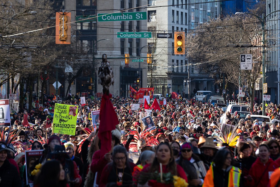 Hundreds of attendees march down East Hastings Street in Vancouver’s Downtown Eastside.