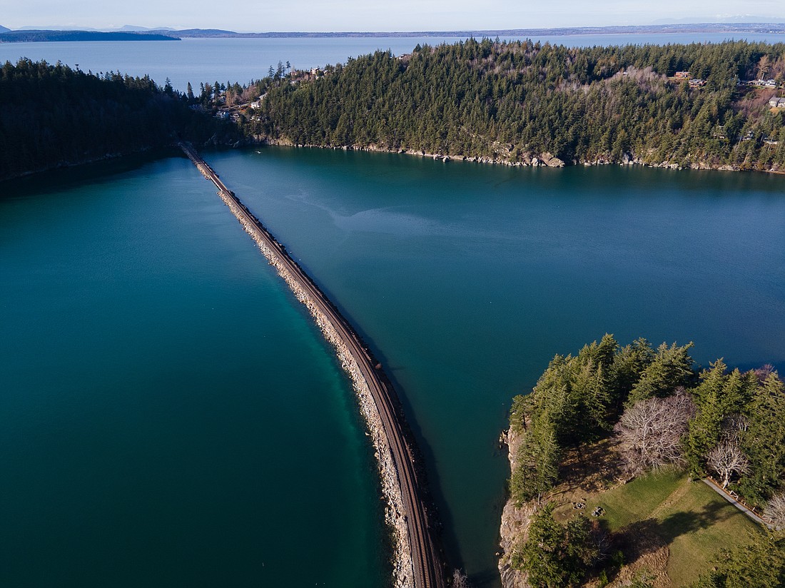 The Woods at Viewcrest project remains in limbo as the city seeks more information from the developers. The proposal, a 38-lot property across approximately 37.7 acres, abuts the Mud Bay Cliffs and sits above the North Chuckanut Bay estuary.