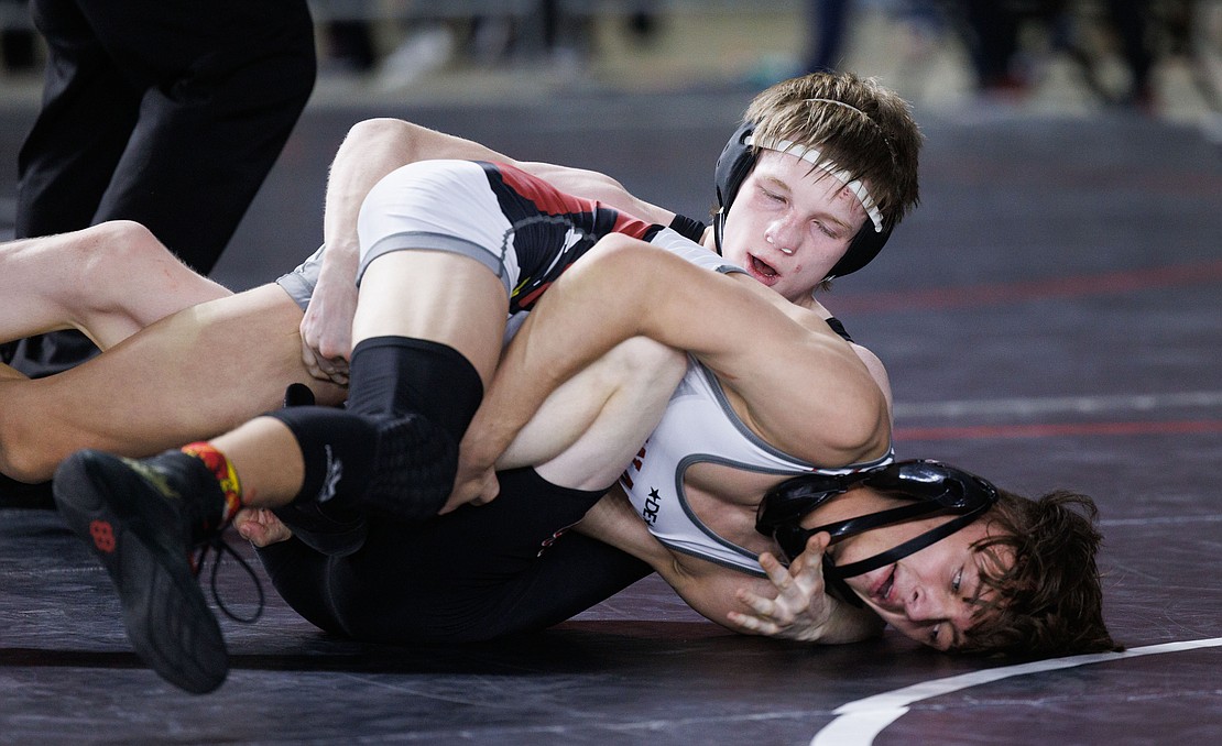 Mount Baker's Jorey Johnson tries to flip his opponent to his back. Johnson lost and ended up finishing in third place.