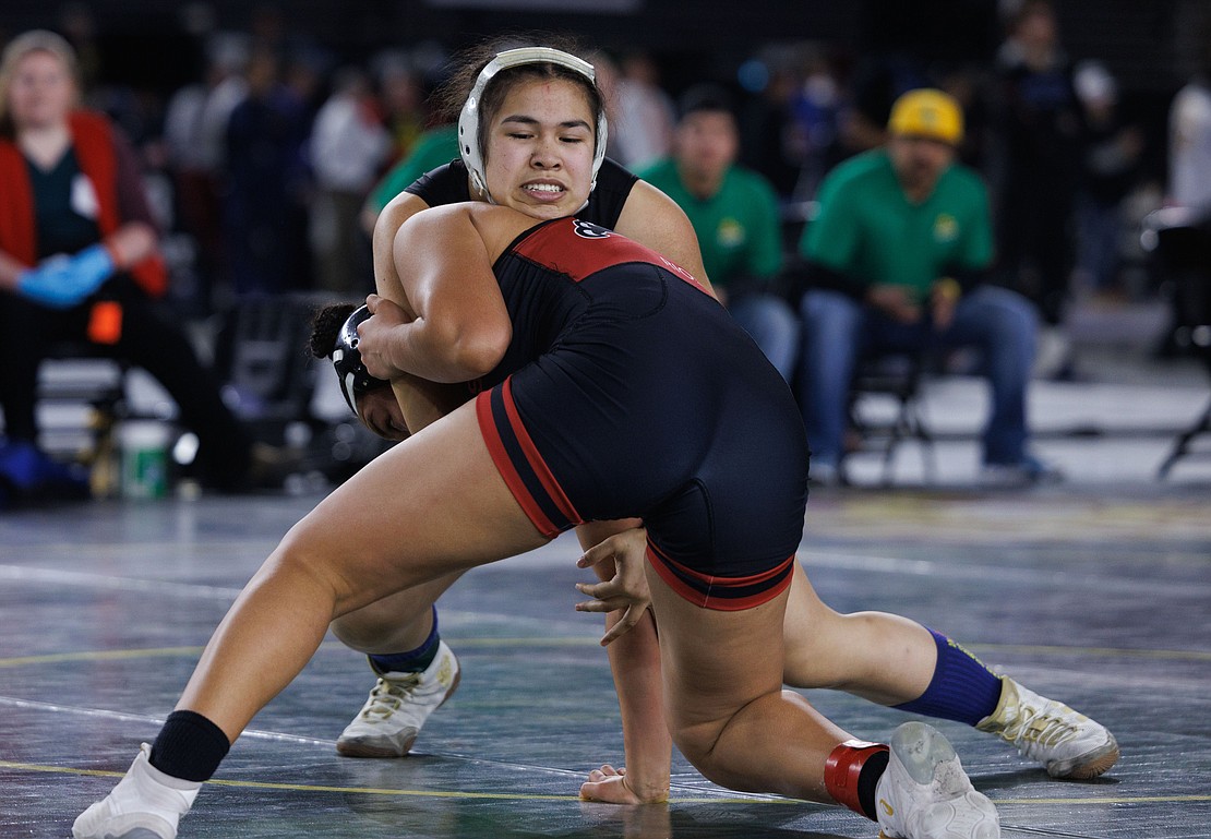 Lynden's Belen Lopez tries to gain control over Toppenish’s Ruby Rodriguez-Rios in their title match. Belen lost, finishing in second place.