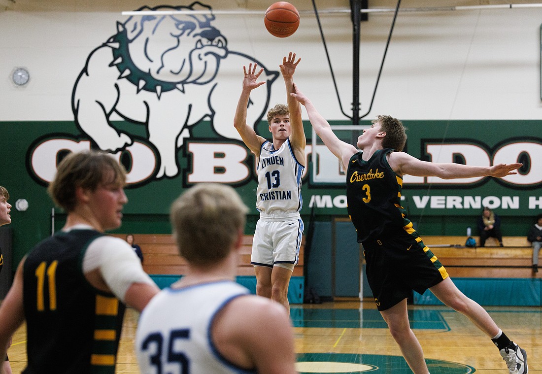 Lynden Christian's Griffin Dykstra sinks a 3-pointer in the second quarter Feb. 25 during the Lyncs' 69-49 win over Overlake in the regional round of state.