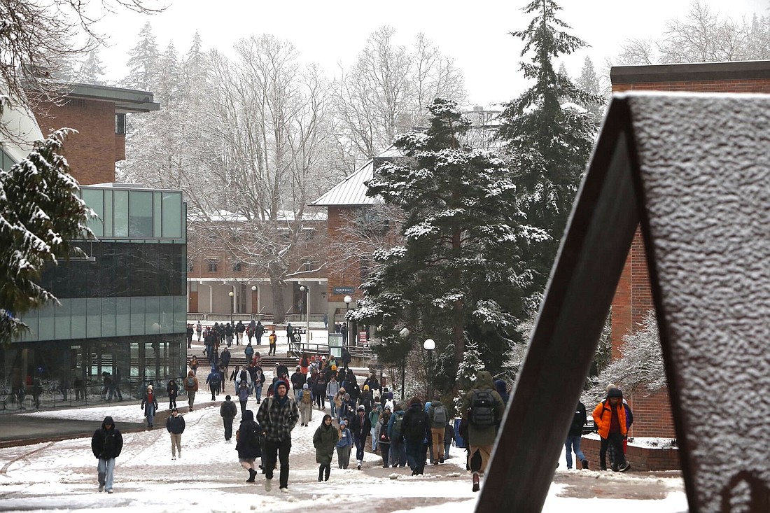 Slushy snow tapering but more Tuesday; January temps later this week