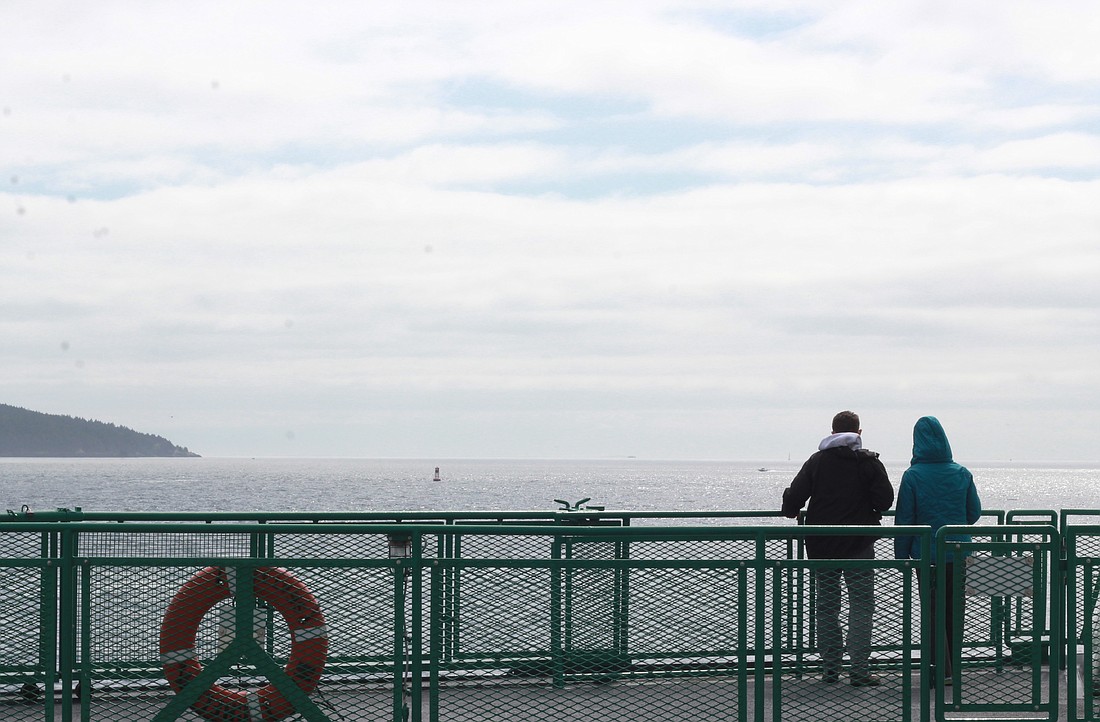 Passengers ride the ferry from Anacortes to Vancouver Island in 2015. The route to Sidney, British Columbia was shut down during the COVID-19 pandemic and won't return to service until 2030 at the earliest, Washington State Ferries said on Feb. 28.