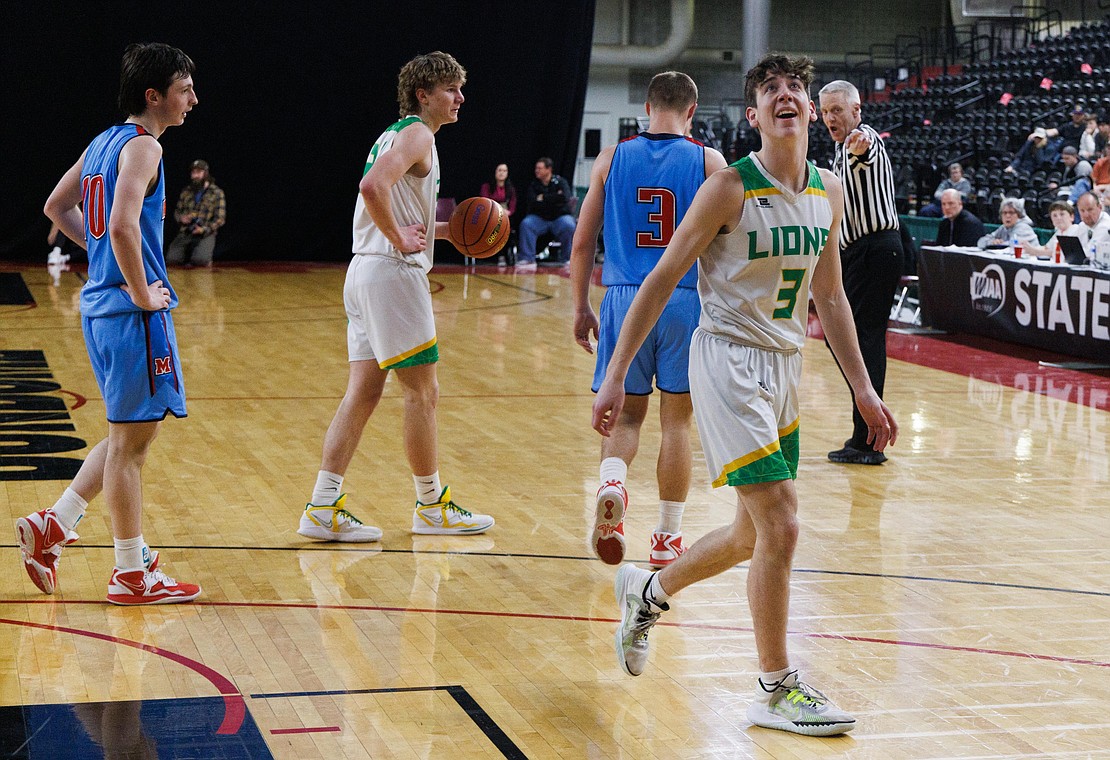 Lynden’s Coston Parcher looks at the scoreboard after fouling out of the game in the fourth quarter.
