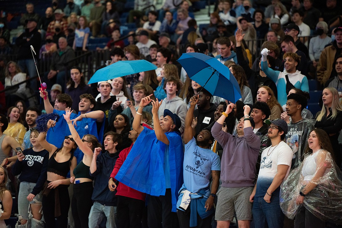 Western's student section dances to "Umbrella" by Rihanna during a timeout.