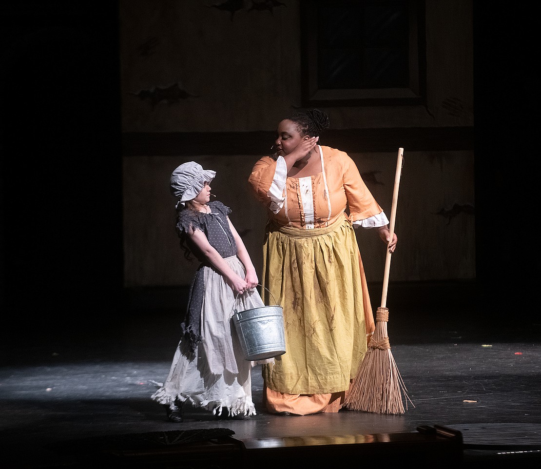 Senior Hope Albright, right, as Madame Thenardier, threatens to smack Little Cosette played by 10-year-old Amelia Machado. Albright has been acting for 10 years total and the past three with Ferndale High School. "Les Mis" was Machado's third play.