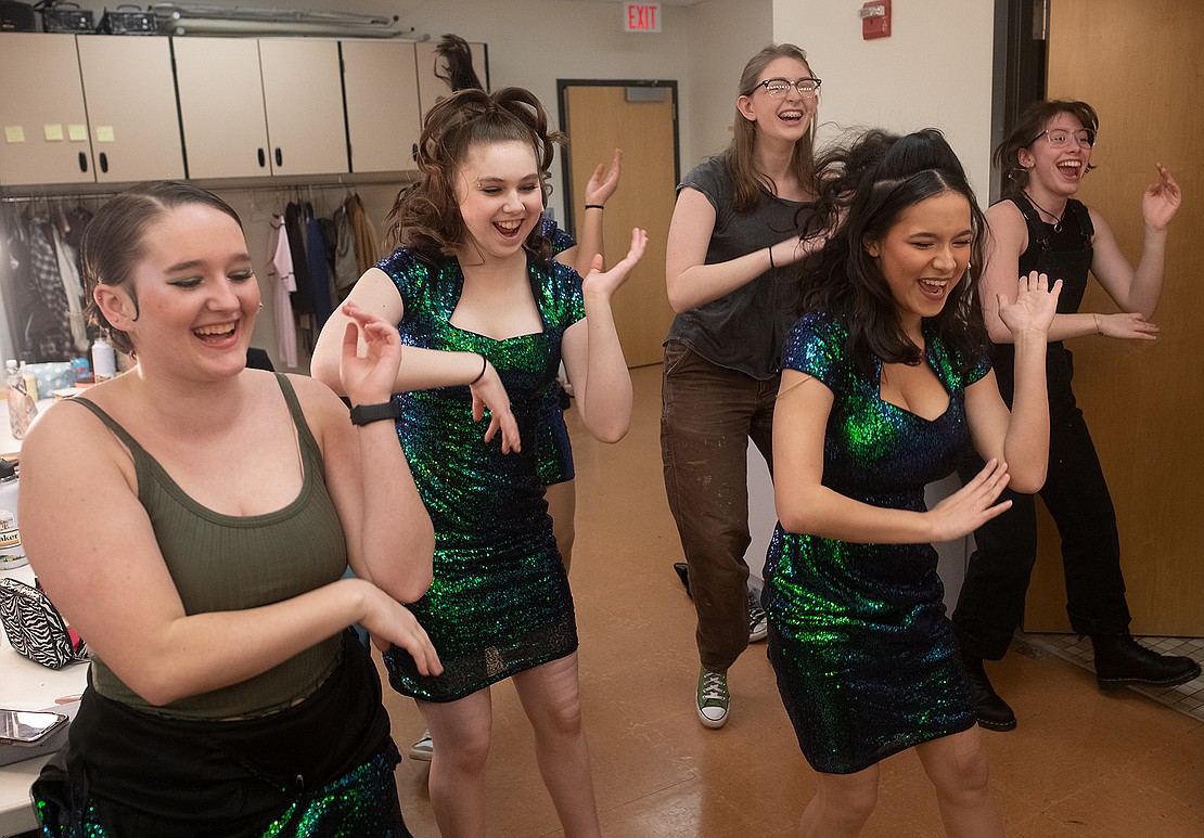 Squalicum High School Drama Club actors and crew members dance to "Rasputin" in the green room about an hour before the show.