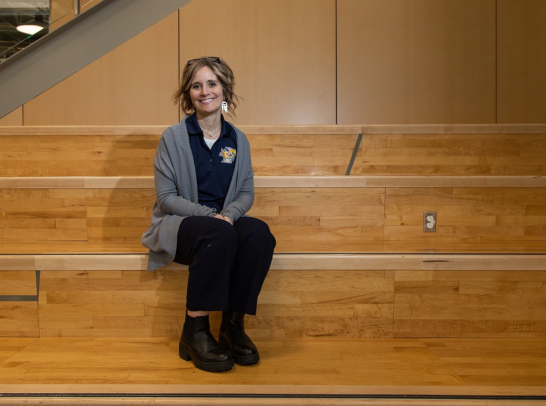 Ferndale School District Superintendent Kristi Dominguez sits on the stairs of the new Ferndale High School commons. She said there is a perception that superintendents spend most of their time in the office, but she's fighting that by frequenting each of the nine schools in the district.