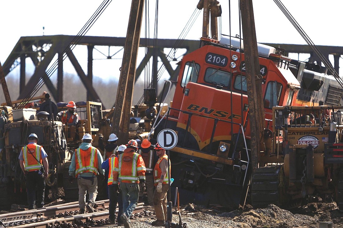 Crews reset an overturned locomotive around noon March 16. A BNSF train derailed shortly after midnight on the Swinomish Reservation in Anacortes. The Washington State Department of Ecology reports no injuries and no impacts to water at this time. Representatives from Ecology, the Environmental Protection Agency, Swinomish Police, the U.S. Coast Guard and BSNF were on the scene.