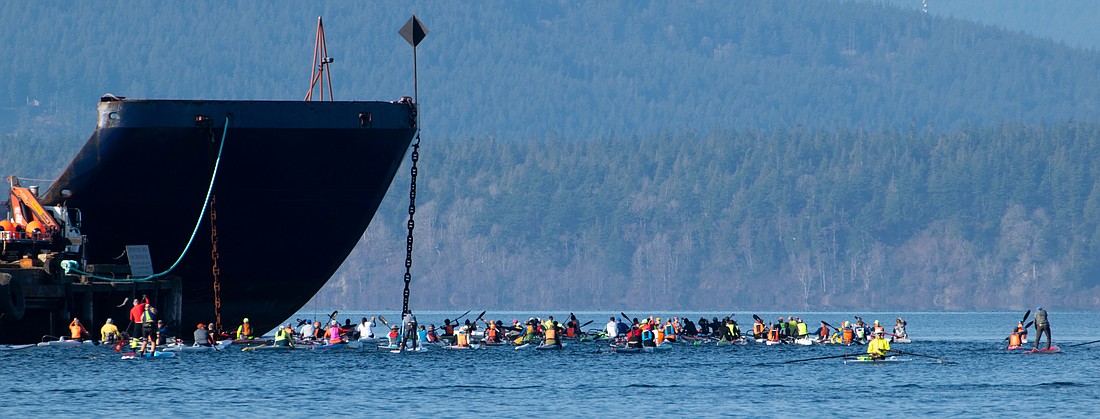 Paddlers set off March 18 on the first lap of the 2023 Peter Marcus Rough Water Race in Fairhaven. More than 100 athletes competed across 20 categories.