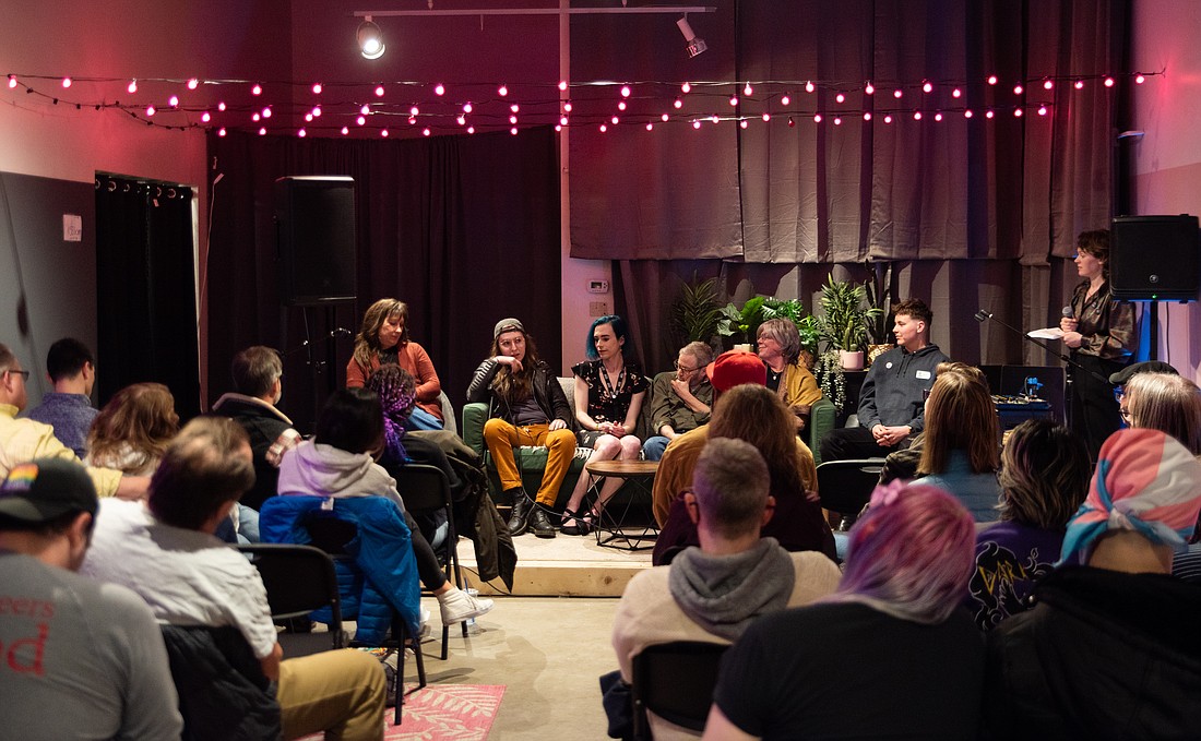An audience listens to panelists March 31 during a series of events to celebrate Transgender Day of Visibility at WinkWink Boutique's event space.