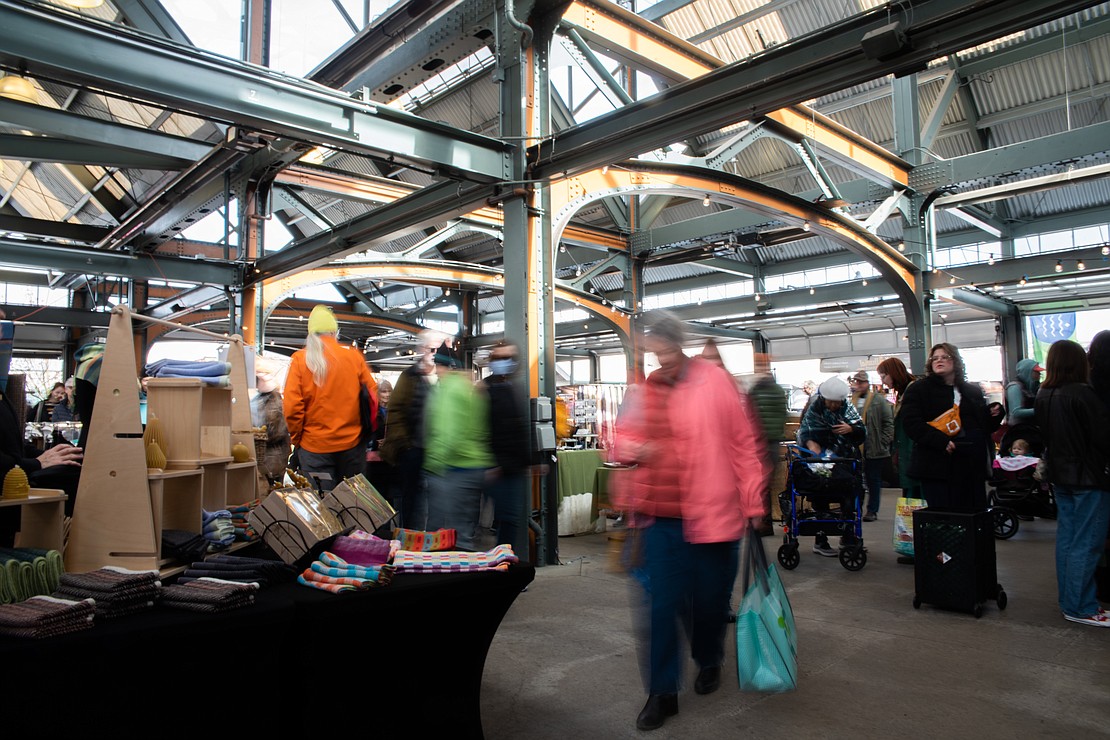 Market-goers browse the vendors in the Depot Market Square building.