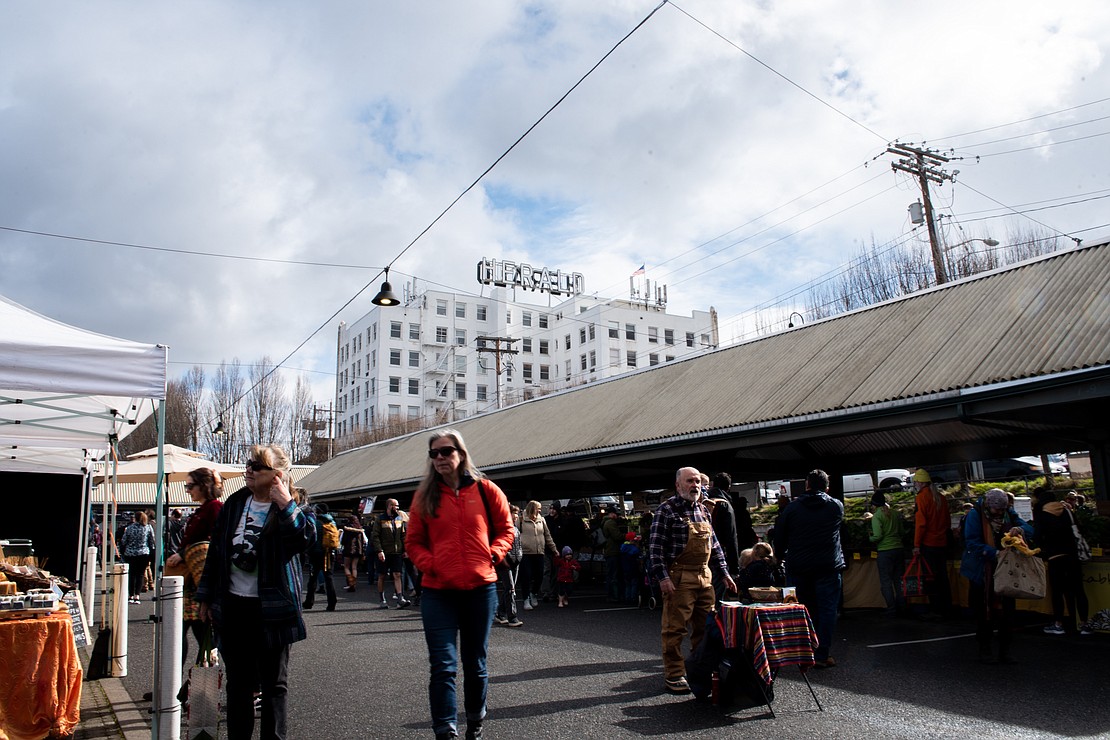 Partially cloudy skies greet the Bellingham Farmers Market on its opening day.