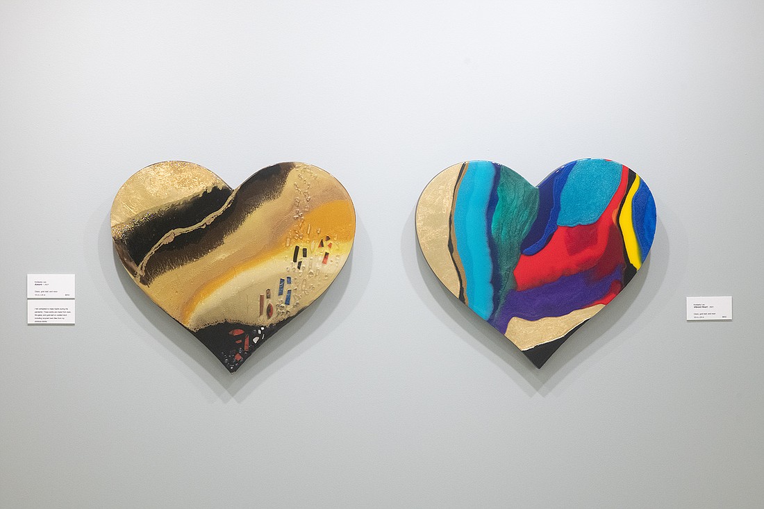 Kimberly Leo's "Amore," left, and "Vibrant Heart" were made during the pandemic from glass, gold leaf, birch and recycled resin tiles from previous works. The pieces can be seen during a closing reception for the multi-artist exhibit "All You Need is Love" Saturday, April 15 at Gallery Syre.