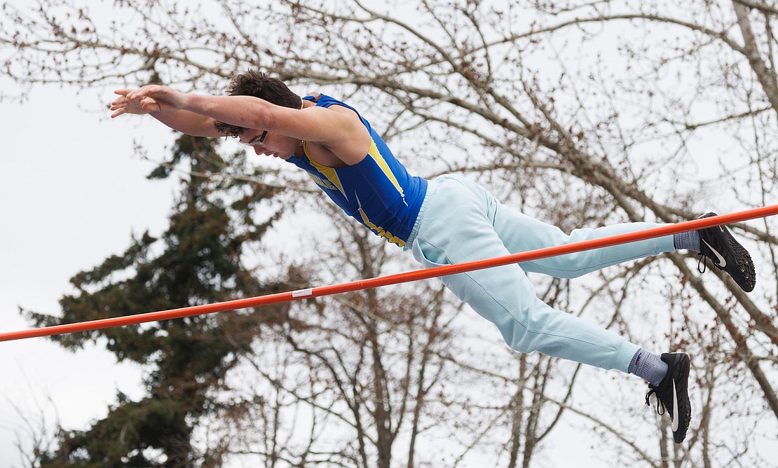 Ferndale's Andrew Finsrud clears the bar during the boys pole vault.