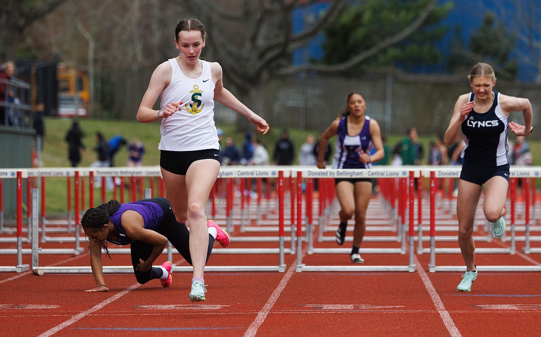 Sehome’s Bella Connell wins her heat of the girls 100-meter hurdles.
