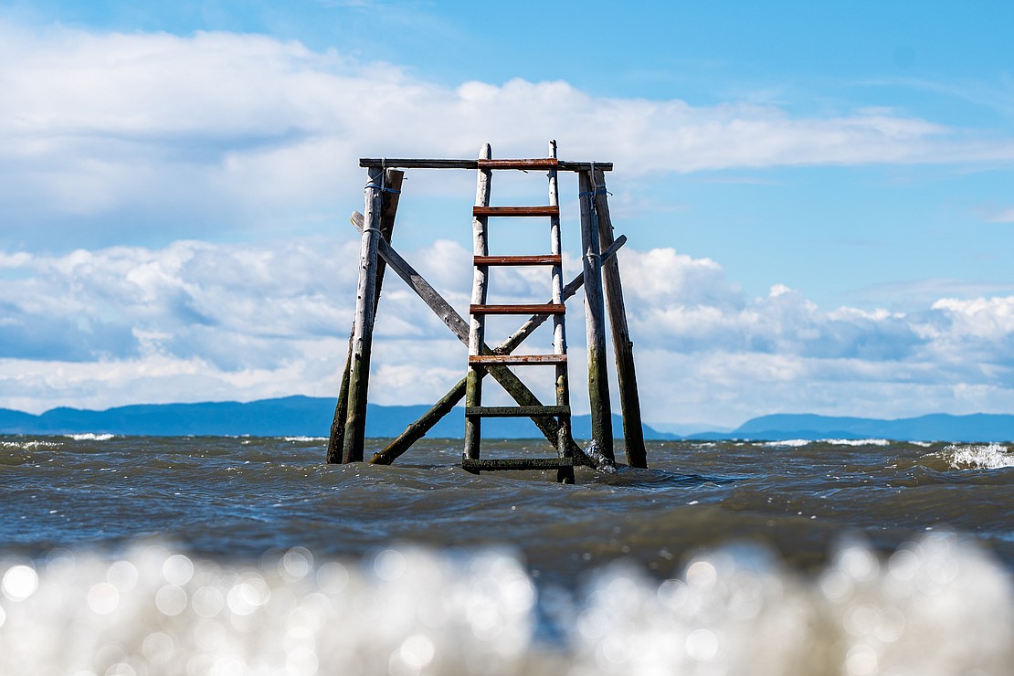 A ladder sits partially submerged April 1 in Birch Bay.