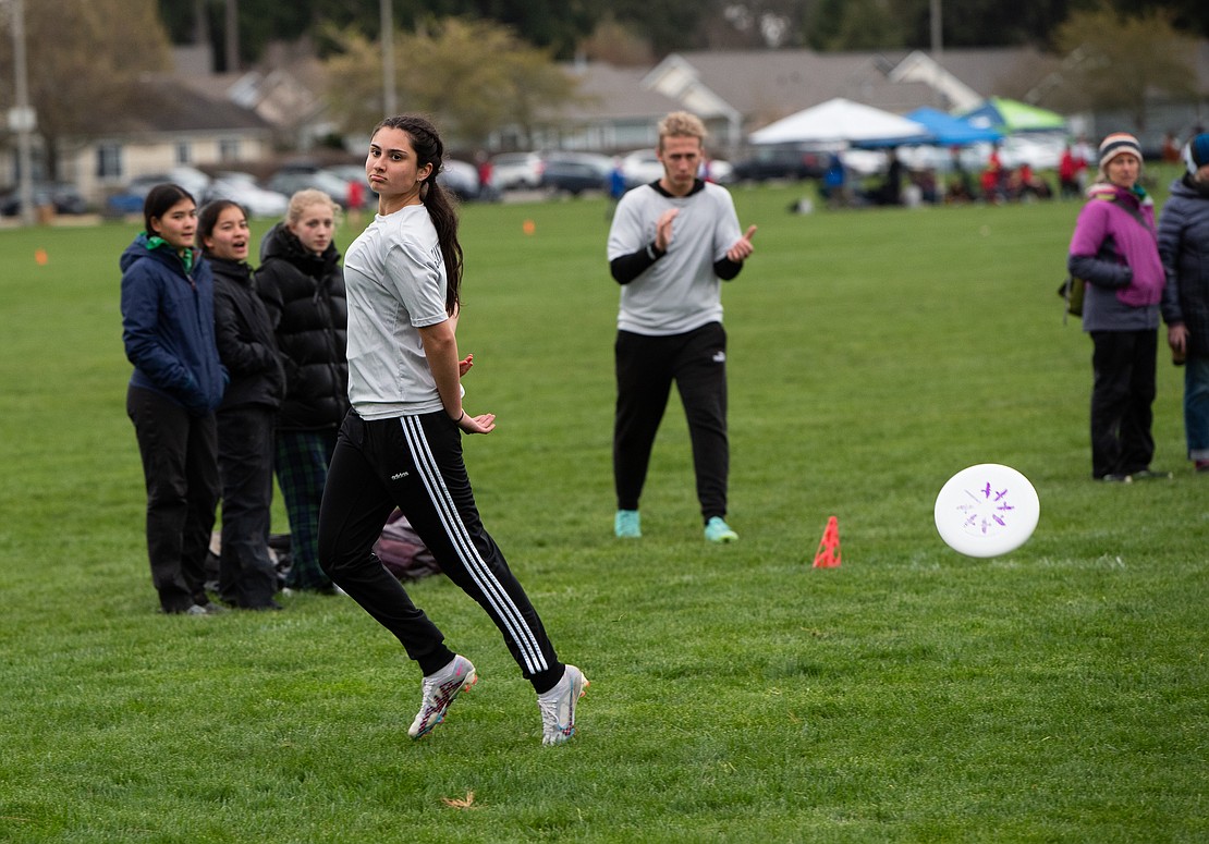 Nathan Hale's Alexa Jeantette-Coca tosses the frisbee after scoring a goal.