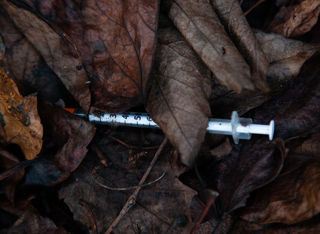 A needle lies in an alley in downtown Bellingham. A temporary state law that makes possession of small amounts of drugs a misdemeanor expires on July 1, so if lawmakers fail to pass a bill, Washington would become the second state — after neighboring Oregon — to decriminalize drug possession.