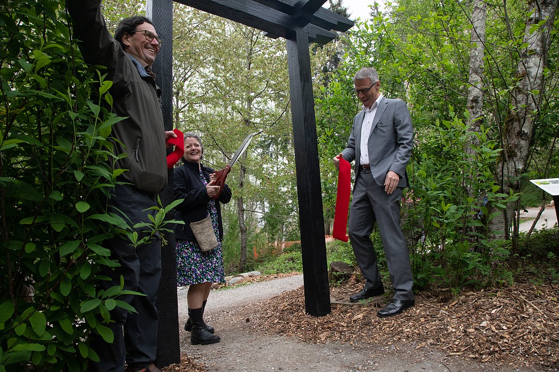 From left, Recreation Northwest Executive Director Todd Elsworth, City of Bellingham Parks and Recreation Director Nicole Oliver and Mayor Seth Fleetwood cut the ribbon May 5, officially opening the outdoor classroom.