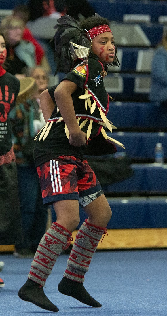 Kason Williams dances during the Coastal Jam. Williams and his family honored his grandmother, Valerie, who went missing and was murdered more than a decade ago.