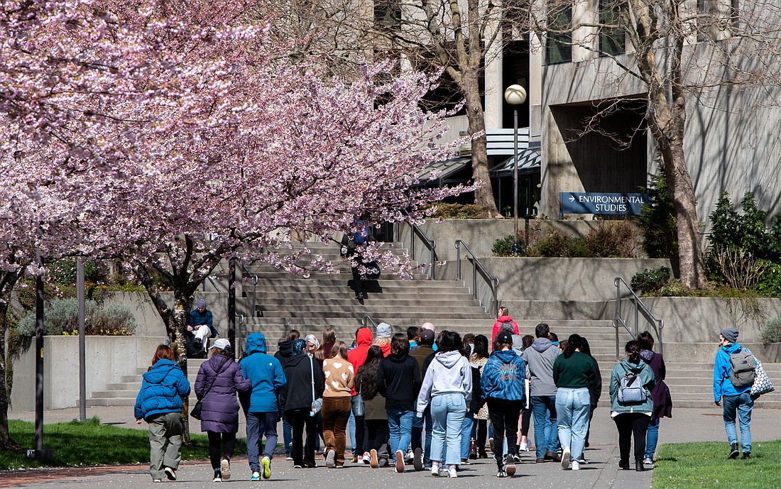A tour group walks through Western Washington University. The U.S. Census Bureau found Whatcom County to have recovered from its population dip in 2021, likely due to pandemic impacts on colleges winding down.