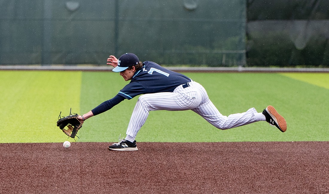 Lynden Christian junior Jonah Terpstra extends for a ground ball May 6 during the Lyncs' 3-2 loss to Overlake in the first round of the 1A District 1/2 tournament.