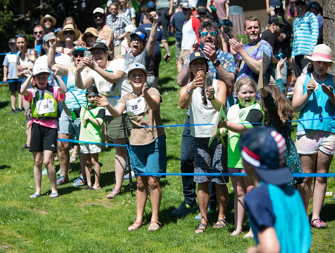 The crowd cheers on runners during the elementary school division of Junior Ski to Sea.