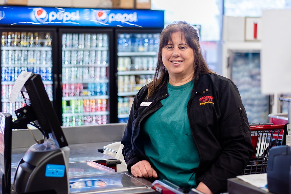 Kathy Dotinga is the lead cashier at Bellingham Grocery Outlet, where she has worked for 22 years.