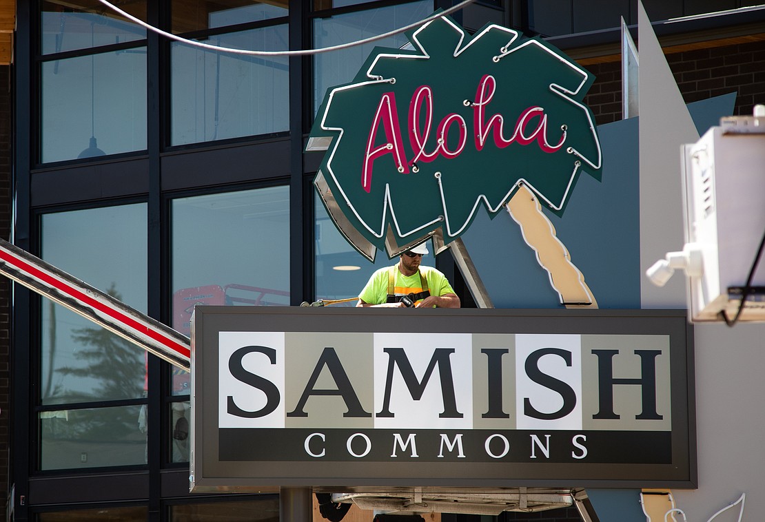 The Aloha Motel sign is reinstalled May 15 at what is now the Samish Commons — a new affordable housing unit on Samish Way. In 2017, the property of the old Aloha Motel site was acquired by the Bellingham Housing Authority. They worked with Signs Plus to restore the original, iconic sign.
