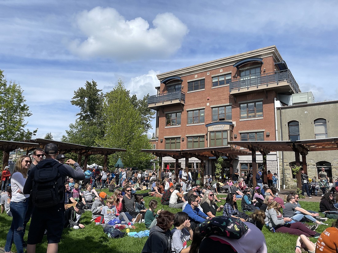 Folks gather at the Fairhaven Village Green for 2022's Fairhaven Festival, which draws visitors and business to the Bellingham neighborhood on the same Memorial Day weekend as the Ski to Sea race. The Fairhaven Association expects an increase in attendance in 2023 as the festival continues recovery from pandemic interruptions.