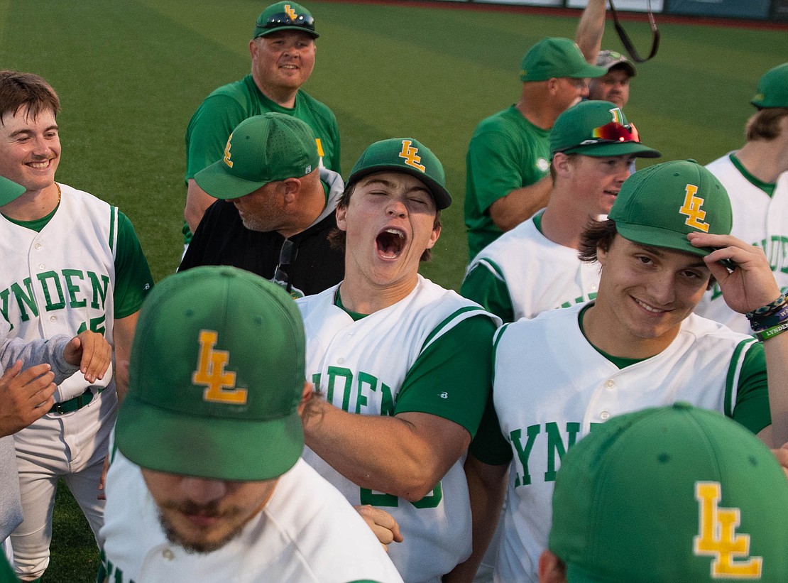 Lynden senior outfielder Campbell Nolte shouts after the team huddle breaks.