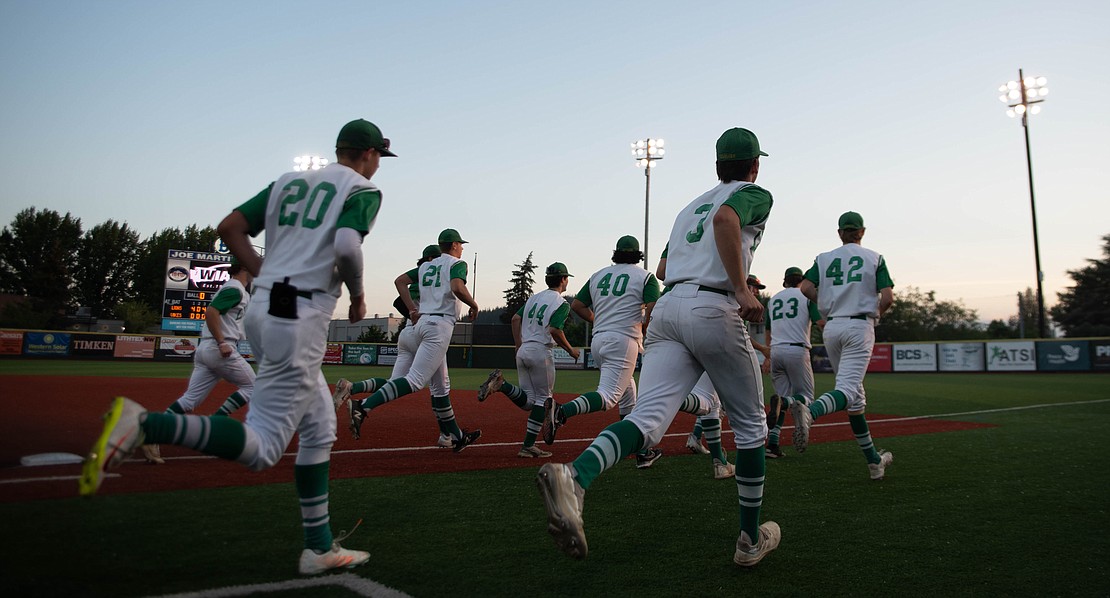 Lynden sprints to the outfield to run after the win.