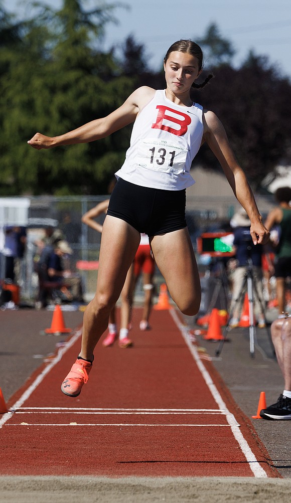 Bellingham's Chayse Flick-Williams leaps for the pit in the 2A girls triple jump. Flick-Williams took third place.