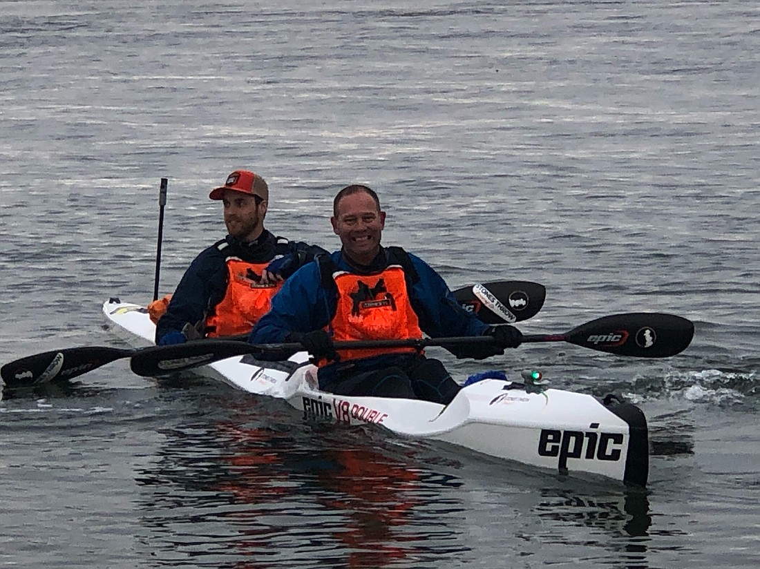 Bart Maupin, front, and teammate Marc Furhmeister reach the 50-mile mark at Point No Point in the 2021 Seventy48 race. “We both just want to finish so we don’t have to do it again,” says Fuhrmeister, a former Western Washington distance runner.