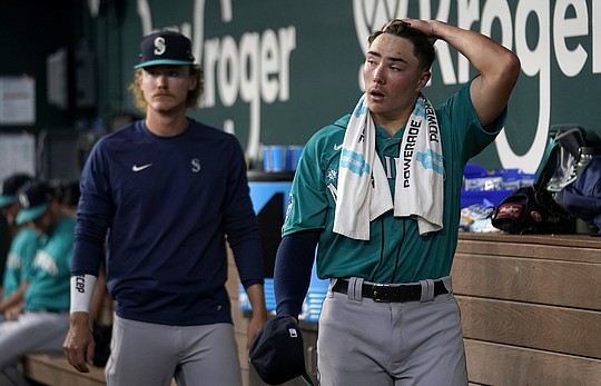 Heim drives in 5 as Rangers keep rolling in 12-3 rout of Mariners