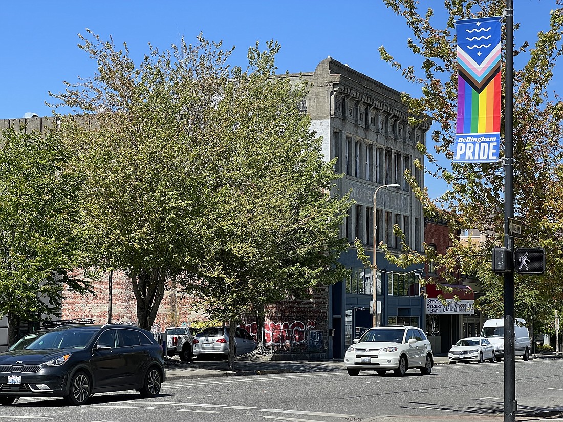 A banner on display in downtown Bellingham on June 5 honors Pride Month. The city plans to paint a rainbow design on a downtown crosswalk as a further show of support to the LGBTQ+ community, despite legal concerns.