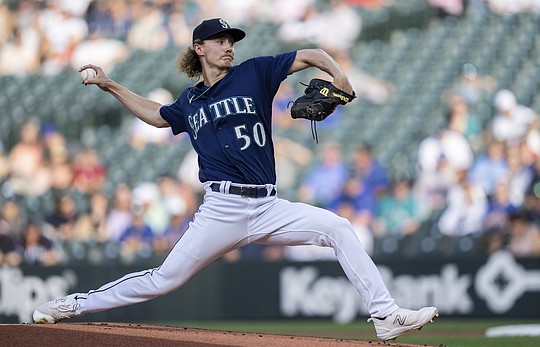 Heim drives in 5 as Rangers keep rolling in 12-3 rout of Mariners