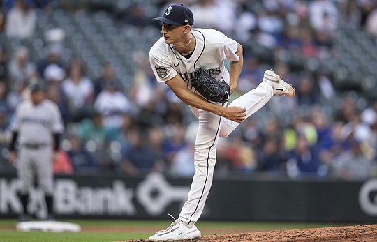 Remillard's 2 big hits off the bench in MLB debut rally the White Sox past  the Mariners 4-3 in 11