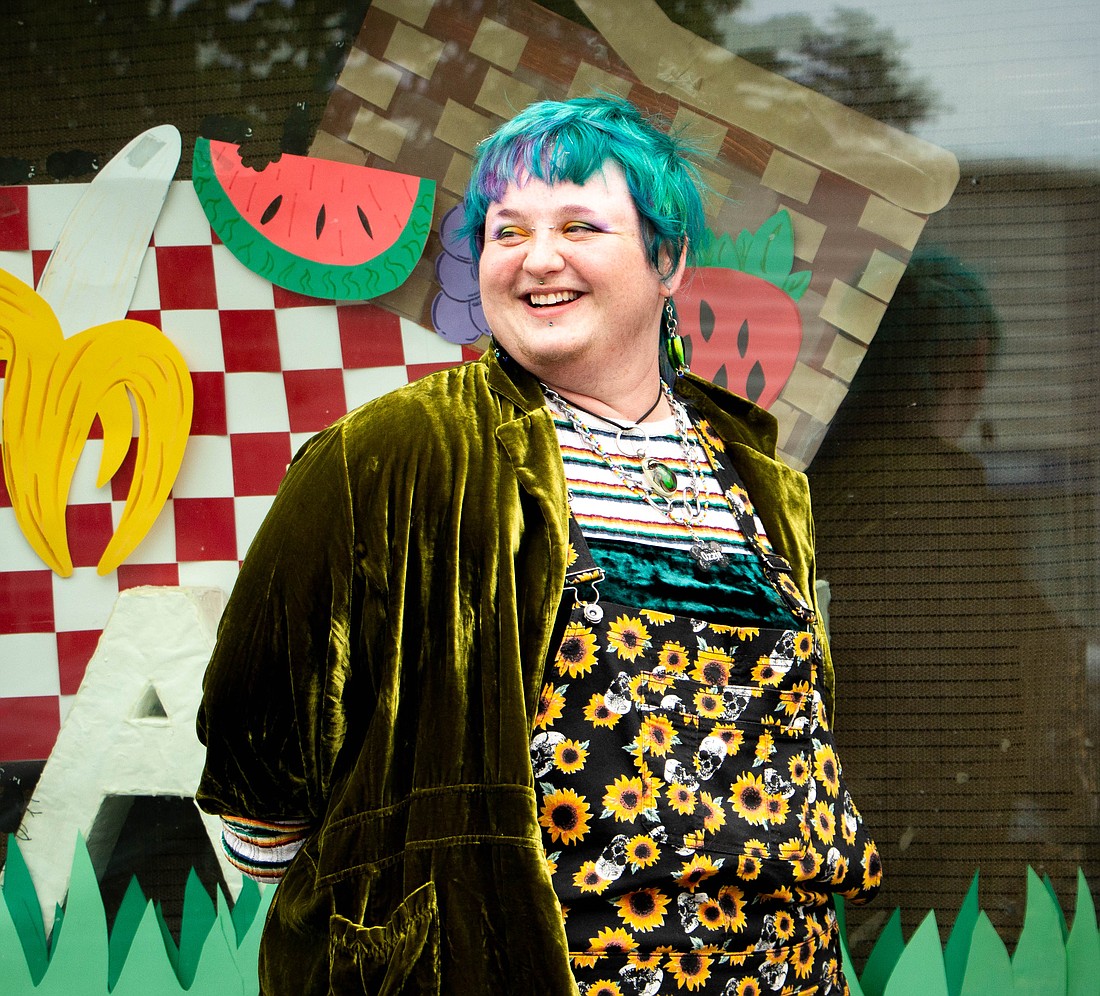 Jae Oslo Lewis, also known as Beedl the Bug Fairy, poses June 21 in front of Art and Happiness, "Bellingham’s Most Magical Art Store."