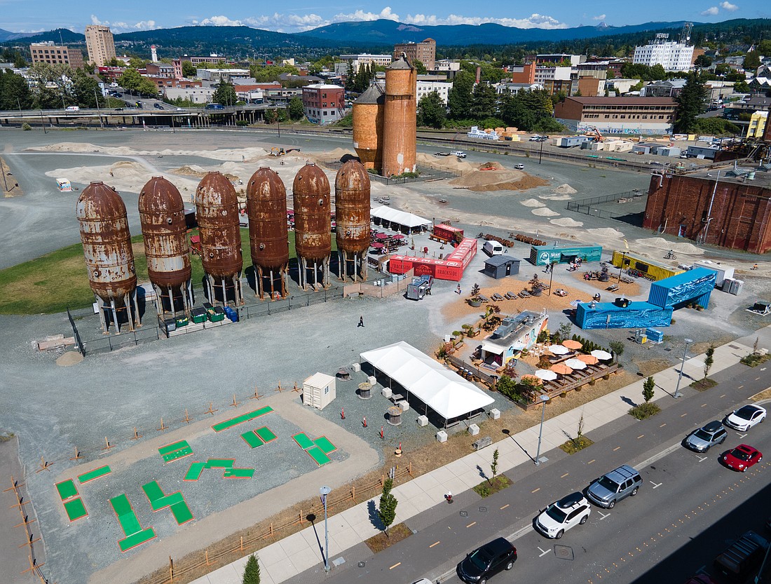 The Portal Container Village on downtown Bellingham's waterfront on June 29, as Portal Putt mini golf prepared to open, lower left, and work is underway on the location for new containers and additions to the bike track, upper right.