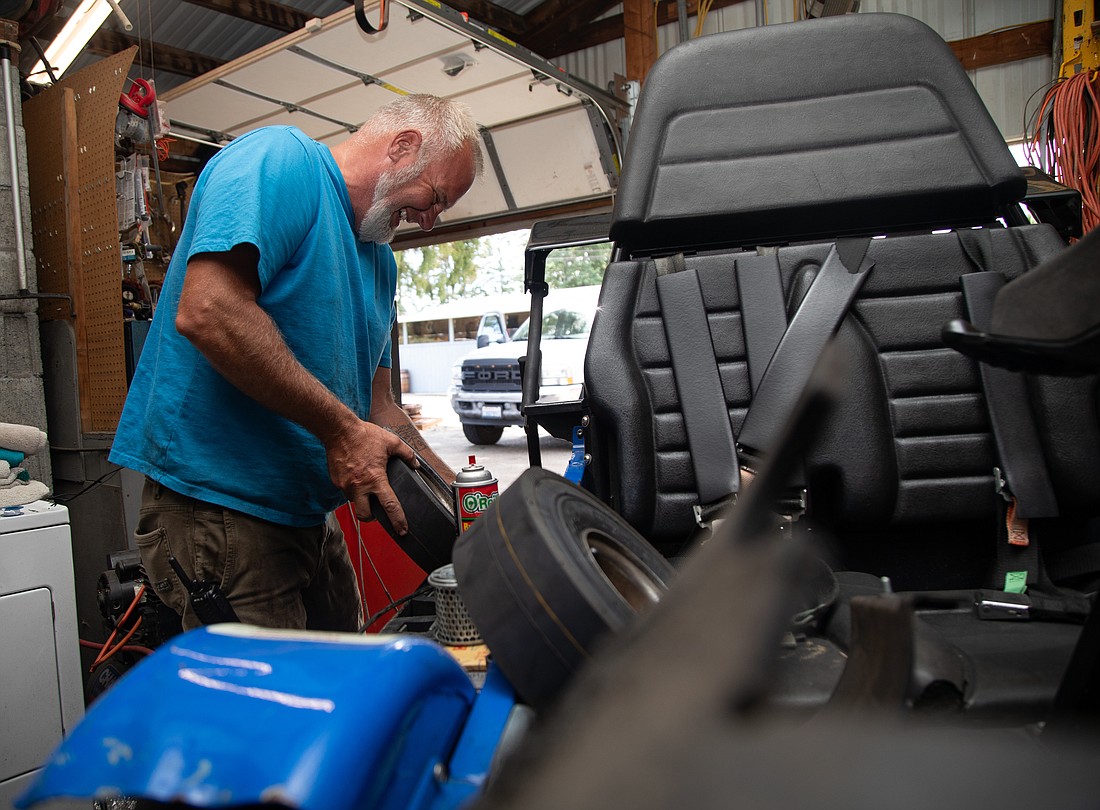 Owner Dale Giffen does maintenance on a go-kart at Station 49 on Thursday, June 29. The Birch Bay amusement center has been in the same family since the 1950s.
