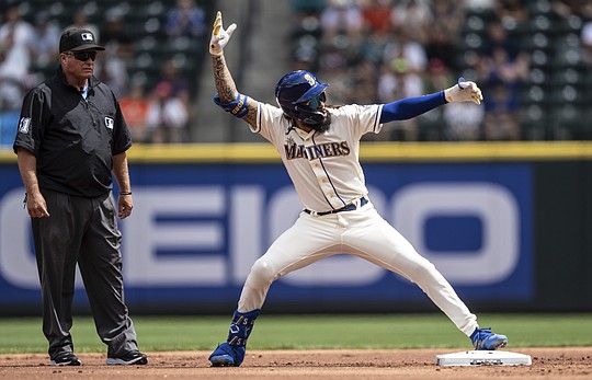 Carpenter homers twice to help Lorenzen and the Tigers beat the Mariners 6-0