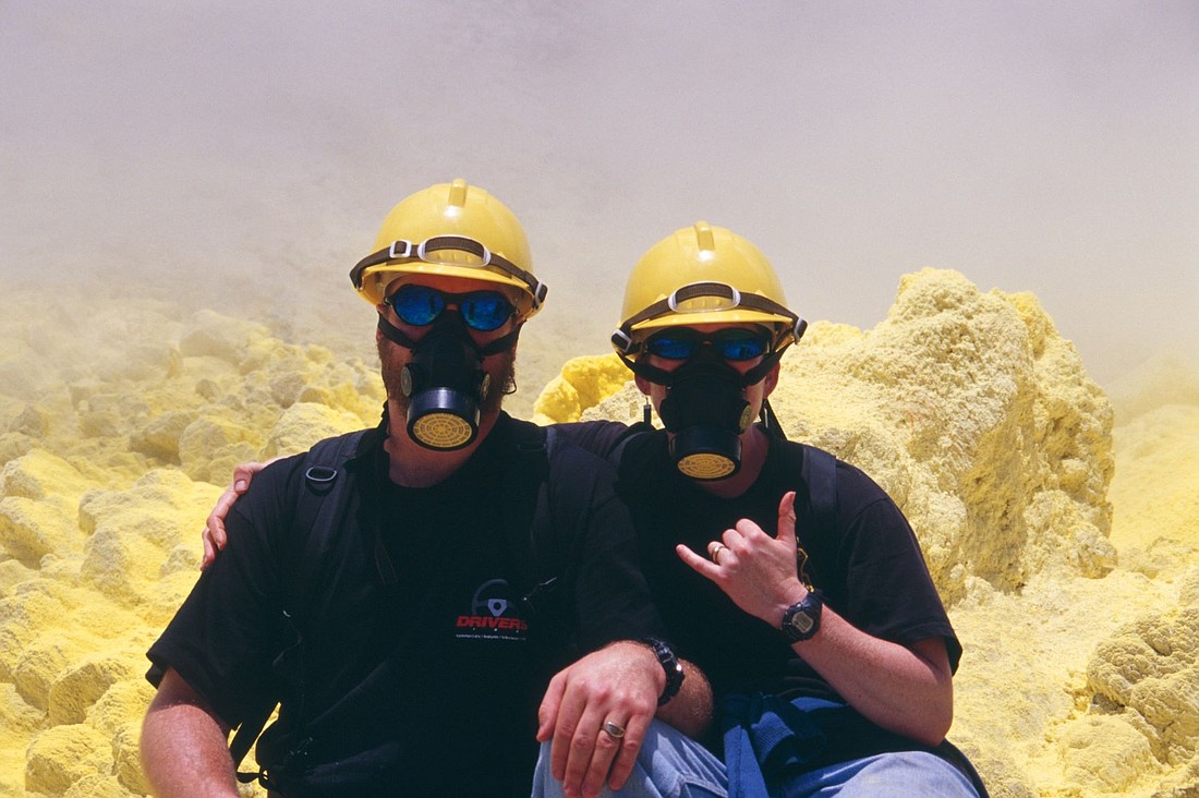 Western Washington University geology professor Jackie Caplan-Auerbach, right, and her husband and former professor Pete Stelling pose together in a photo while surround by sulfur at a volcano in New Zealand. Caplan-Auerbach went viral for identifying the "Swift Quake" by analyzing seismometer readings following the Seattle Taylor Swift concerts.