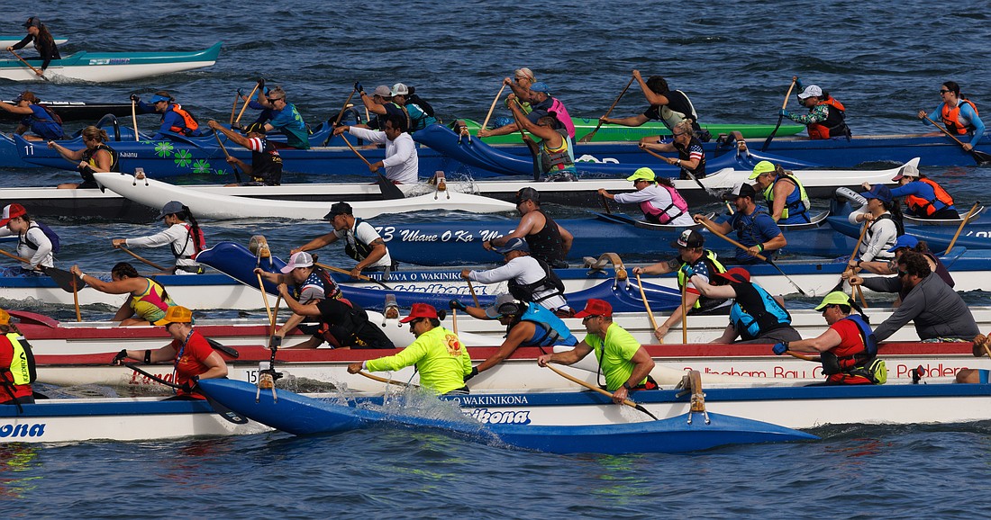 Outrigger canoers get their oars going at the start of the mixed/women’s races Saturday, Aug. 12 at the Bellingham Bay Classic at Boulevard Park.